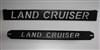Nápis Land Cruiser na expediční zahrádku